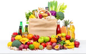 Premier Homecare Services Blog/Articles shopping bag full of fresh fruits and vegetables with assorted ingredients