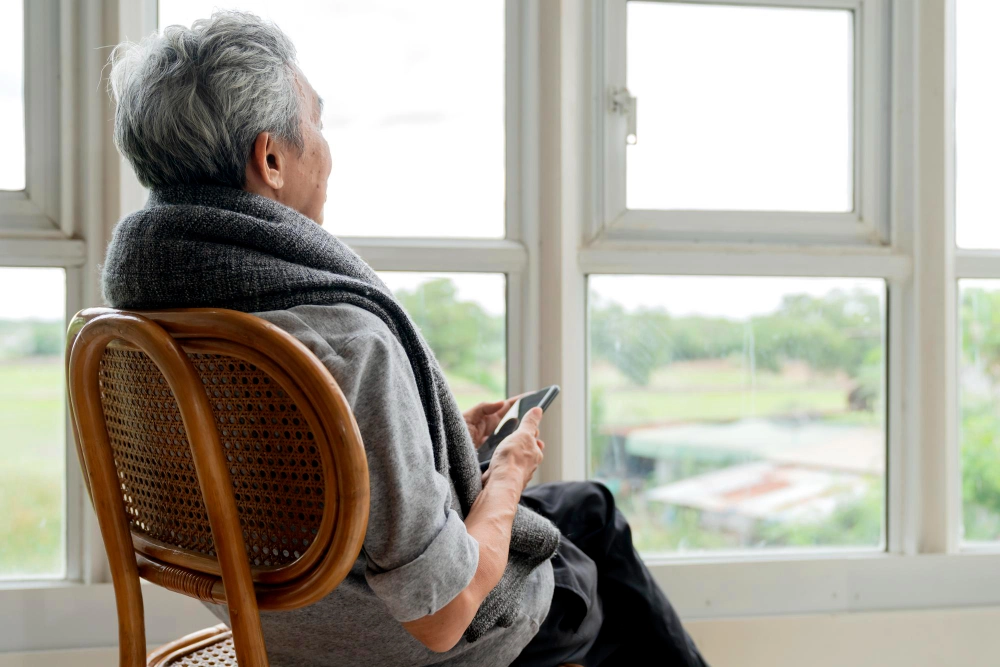 dementia home care patient looking out the window