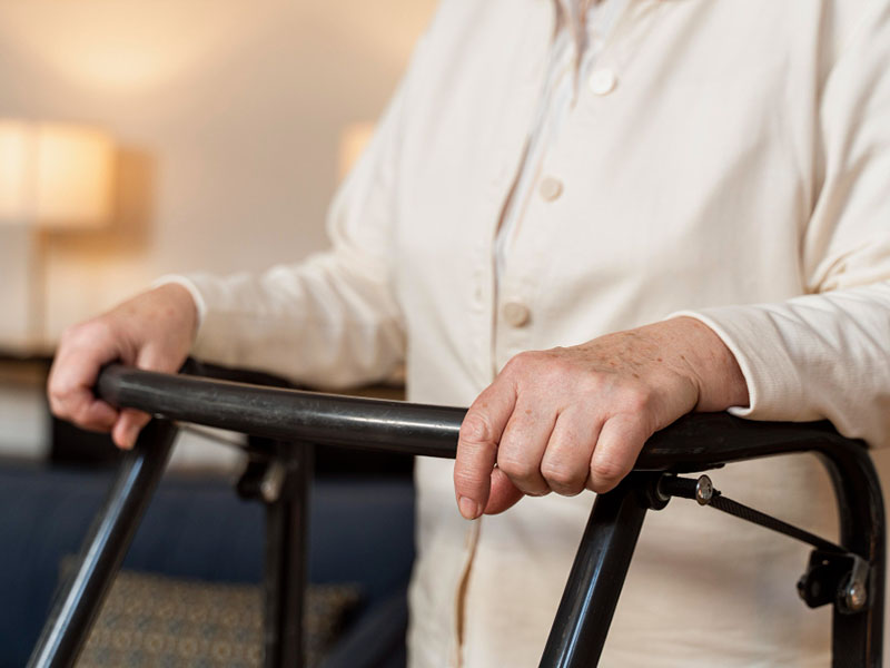 Staying Steady Simple Fall Prevention Tips for Seniors senior using a walker